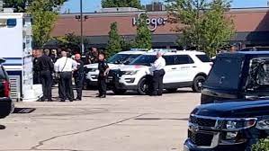 Workers at a Tennessee grocery store hid in freezers to survive a mass shooting that left one lady dead and 14 others injured.