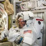 NASA astronauts prepare for a spacewalk.