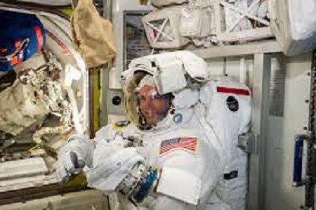 NASA astronauts prepare for a spacewalk.