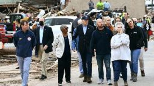 Biden visits Kentucky to assess tornado damage.
