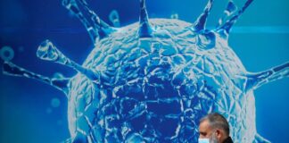 Merck's COVID-19 antiviral medication obtains US approval.
