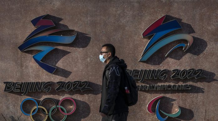 Omicron won't delay the Beijing Games, and fans may attend.